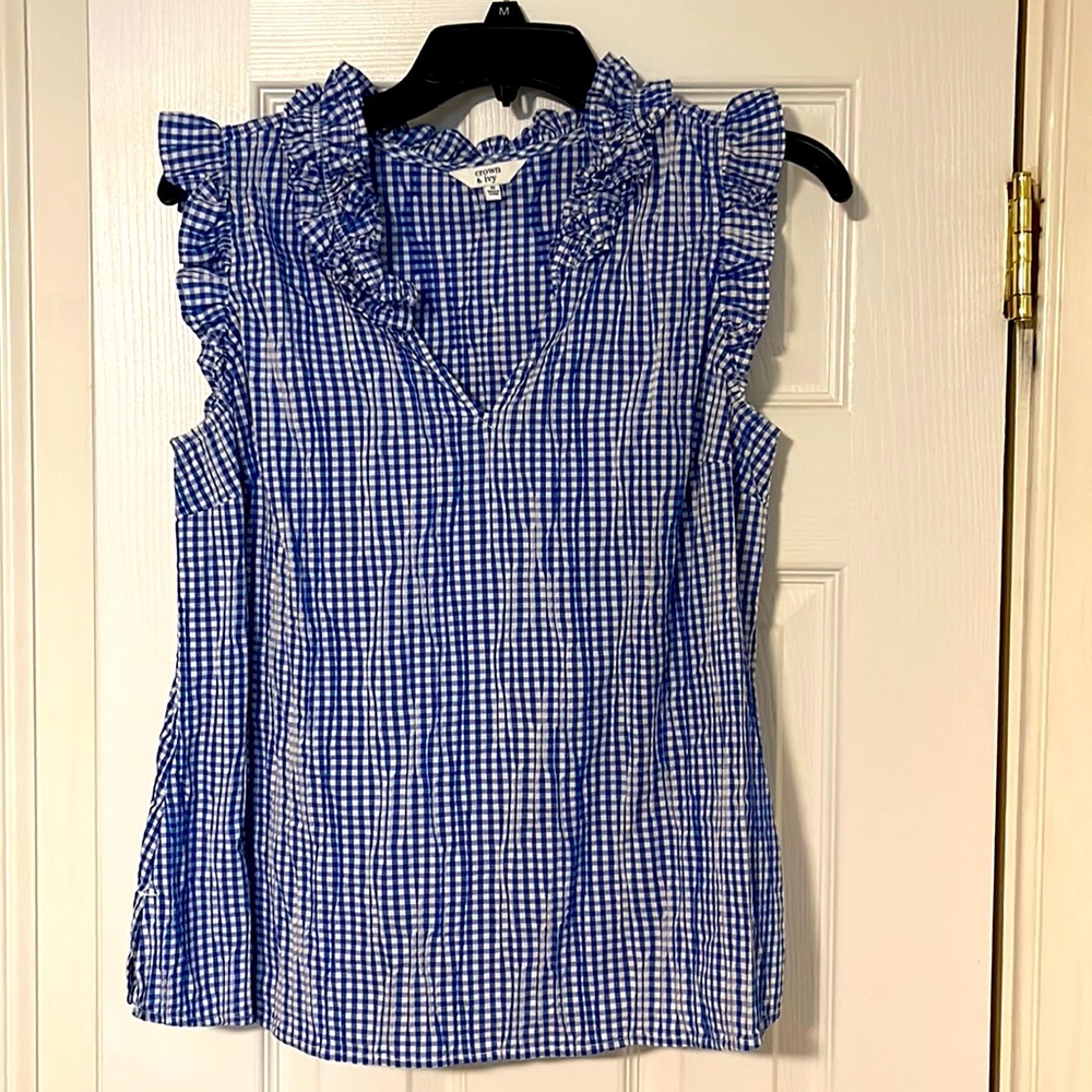 Cute top - runs a tad short. Royal blue and white checkered print.